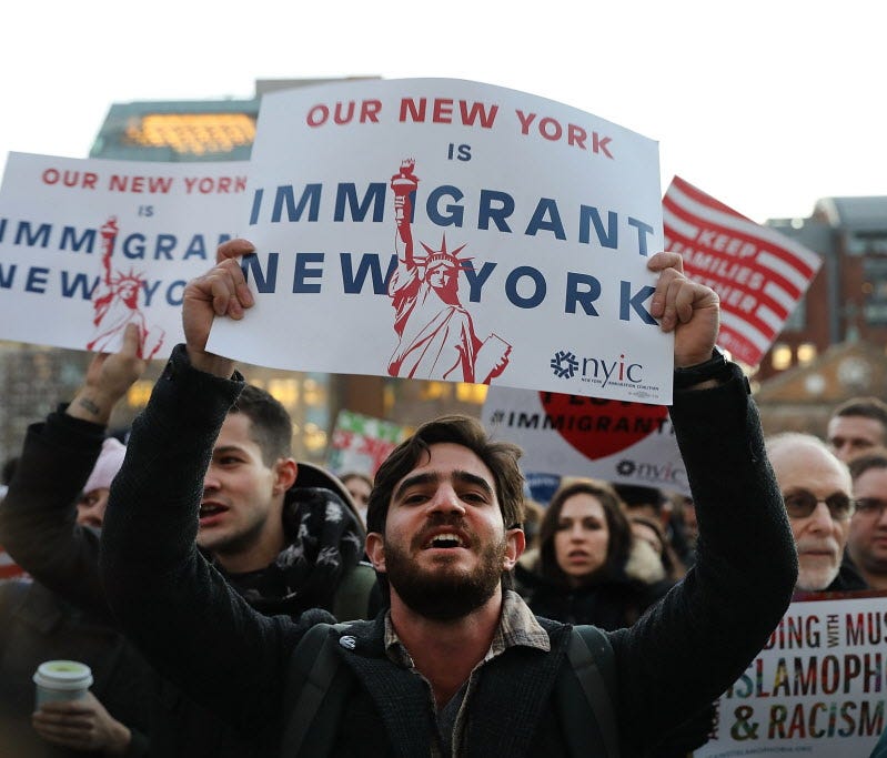 Hundreds of people attend an evening rally at Washington Square Park in support of Muslims, immigrants and against the building of a wall along the Mexican border on January 25, 2017 in New York City. President Donald Trump took actions today to star