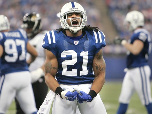 Colts defensive back Bob Sanders flexes for his fans