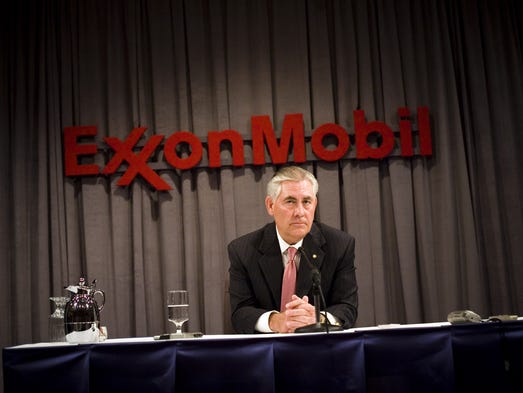 Tillerson speaks at a news conference after the ExxonMobil