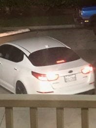 This is picture of the white Kia Optima that police are looking for.