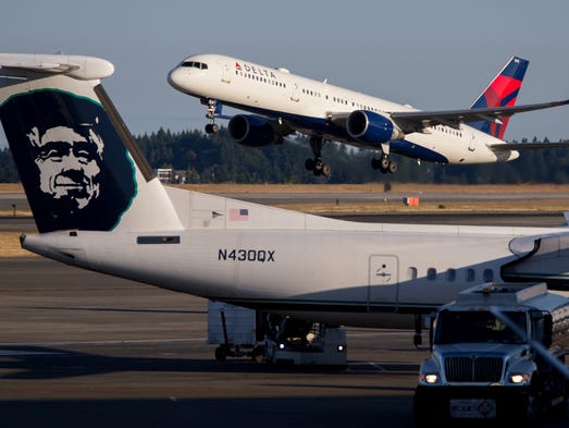 A Delta Air Lines Boeing 757 takes off from Seattle-Tacoma