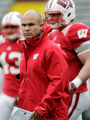 In this April 15, 2013 photo, former Wisconsin Badgers defensive coordinator Dave Aranda watches an NCAA college football practice practice in Madison, Wis. New LSU defensive coordinator Dave Aranda wasnt going to let recent uncertainty surrounding his new boss dissuade him from seeing what he could do with a Southeastern Conference defense in Death Valley. It was always a goal of mine to coach in this league, Aranda, who spent the past three seasons at Wisconsin, said during his formal introduction at LSU on Tuesday, Jan. 5, 2016. (M.P. King/Wisconsin State Journal via AP) MANDATORY CREDIT