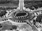 In this photo from 1953, cars maneuver the traffic