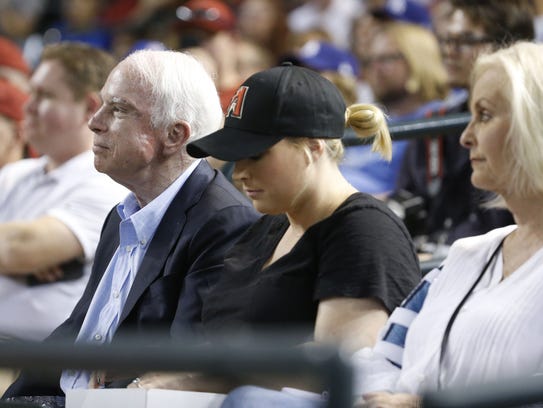 Sen. John McCain watches a Diamondbacks vs. Dodgers