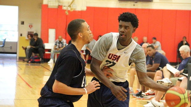 UA recruit Josh Jackson, right, is defended by Brekkott Chapman at USA Basketball’s U19 camp.