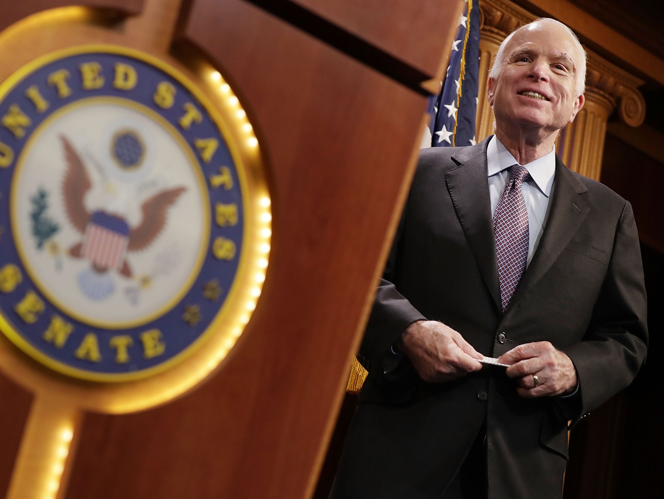 Sen. John McCain takes part in a news conference on July 27, 2017, on Capitol Hill.