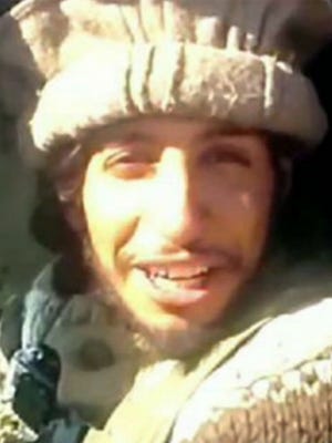 This undated image taken from a militant website on Monday Nov. 16, 2015 showing Belgian Abdelhamid Abaaoud. A French official says Abdelhamid Abaaoud is the suspected mastermind of the Paris attacks was also linked to thwarted train and church attacks.