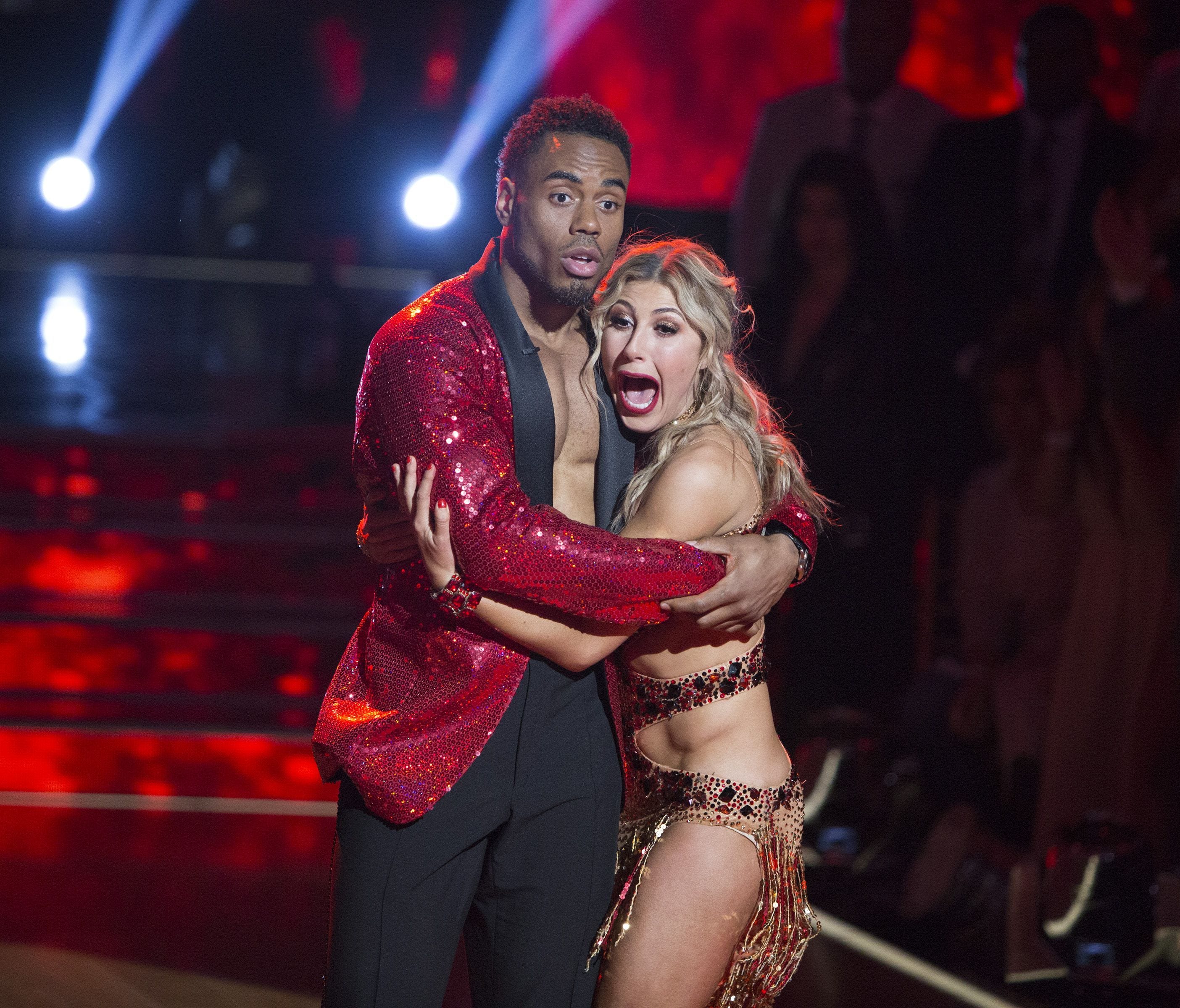 'Dancing with the Stars' champ Rashad Jennings, left, hugging partner Emma Slater, sure looks surprised just after hearing they won ABC's 'Dancing with the Stars.''