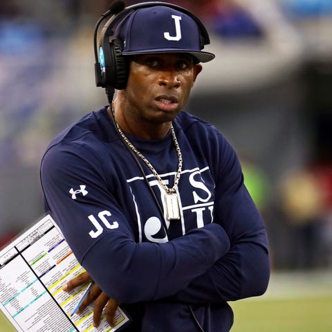 Jackson State head coach Deion Sanders watches fro