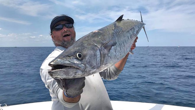 Ocean fishermen, like this angler with a big king mackerel, stand to benefit the most from changes under the Modern Fish Act that now must pass the U.S. Senate.  It passed the House of Representatives on July 11.