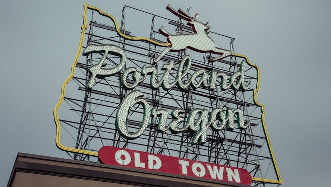 Portland Oregon sign above Old Town.
