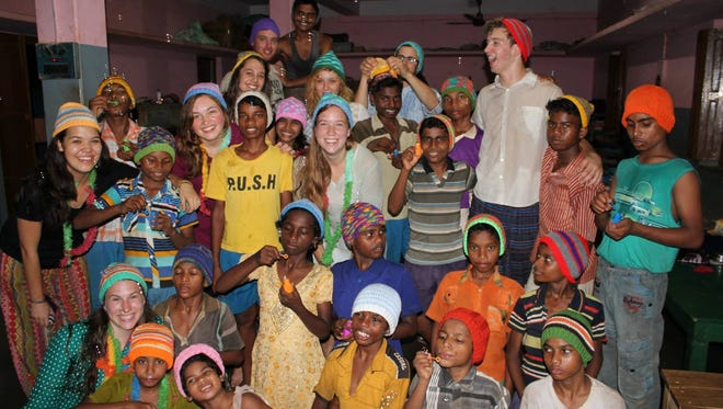 In India (April-May 2015) I had the privilege of living at an orphanage and spending time with these kids non-stop! One of our last days there, our team put together a big celebration night which is what this picture is from. We bought Indian treats, gave out hand made hats that were donated to our team, and had lots of bubbles and balloons. These children will always have a very special place in my heart.