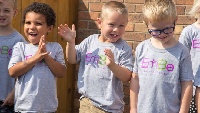 Boys from the Ready, Set, Grow Preschool at the YWCA of Mitchell celebrate the merger with EmBe in Sioux Falls.
