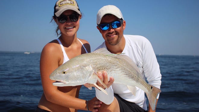 Capt. Royce Dahnke of Destin caught and released this redfish in October bearing a special tag placed by the Coastal Conservation Association.  Redfish tagged by the CCA and caught by anglers registered in the CCA's STAR tournament are eligible for special prizes.