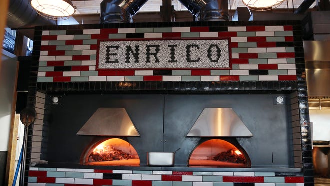 The coal-fired oven is named “Enrico” after chef/owner Tony Galzin's great-grandfather.