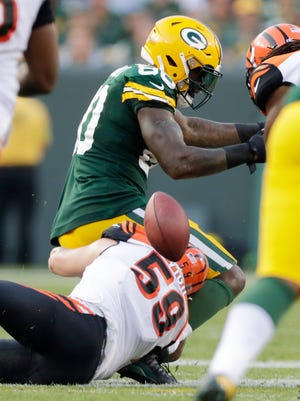 Green Bay Packers tight end Martellus Bennett (80) drops a pass in the fourth quarter against the Cincinnati Bengals on Sept. 24, 2017 at Lambeau Field.