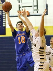 Nate Chorney of Thomas A. Edison puts up a shot as