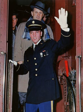 Some 200 fans waited at Union Station to welcome Elvis Presley home from his stint in the U.S. Army on March 7, 1960. He was wearing a (non-issue) dress blue Army uniform made in Germany. Elvis was discharged at the rank of sergeant, but the tailor had mistakenly given him the stripes of staff sergeant. The formal white shirt was a gift from Frank Sinatra delivered March 3 by his daughter, Nancy, on Elvis' first day back in the U.S. On March 26, Elvis would tape a special 'Welcome Home, Elvis' version of Sinatra's ABC-TV variety show, which aired May 12. Asked by reporters if he planned to wiggle his hips when he returned to singing, Elvis said: 'I'm gonna sing and I'll let the shaking come naturally. If I had to stand still and sing, I'd be lost. I can't get any feeling that way.'