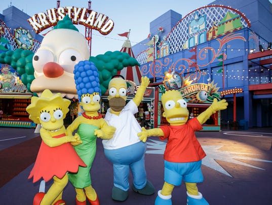 636010767463285711-Springfield-Simpsons-Family-at-Simpsons-Ride.jpg