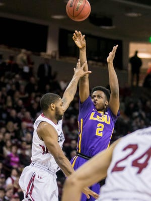 LSU Tigers guard Antonio Blakeney (2) shoots over South Carolina Gamecocks guard Sindarius Thornwell (0) in the first half at Colonial Life Arena.