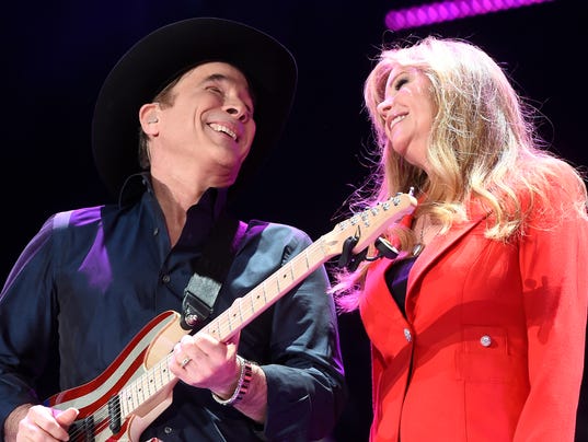 Who are Clint Black and Lisa Hartman?