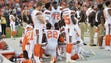 Members of the Cleveland Browns kneel during the national