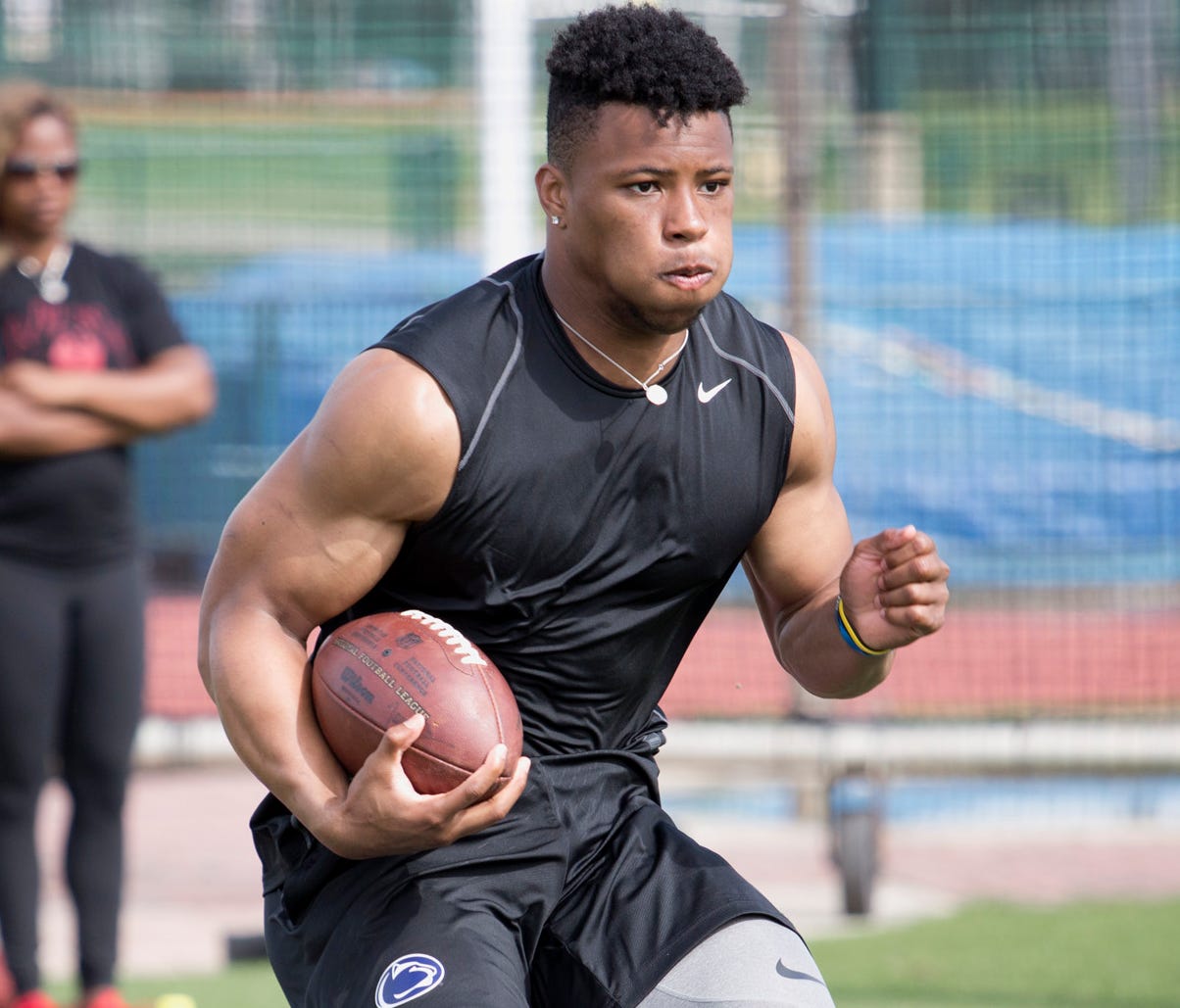 Former Penn STate RB Saquon Barkley working out in Walt Disney World.
