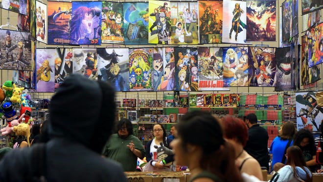 Banners and posters are displayed for customers during the Realms Con on Saturday, Oct. 3, 2015, at the American Bank Center in Corpus Christi.