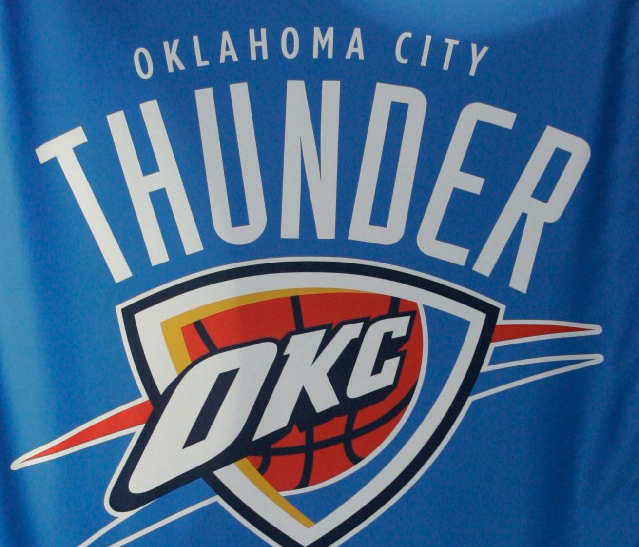 A banner with the name, logo and colors of the Oklahoma City Thunder.