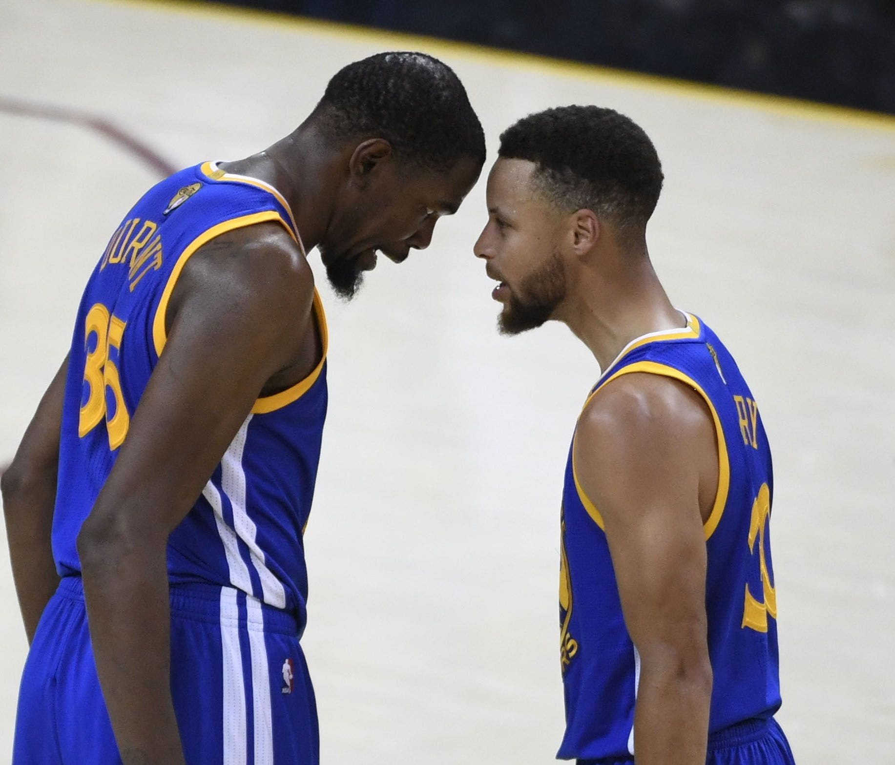 Kevin Durant celebrates with Stephen Curry during Game 3 of the NBA Finals