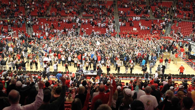 A general view of the Texas Tech Red Raiders students as they storm the court after the Red Raiders defeated the Iowa State Cyclones 78-73 at United Supermarkets Arena.