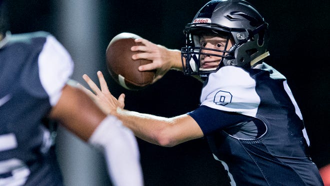 Anderson County's Stanton Martin (9) throws a pass during a game between Anderson County and Heritage at Anderson County High School in Clinton, Tennessee on Friday, September 22, 2017.