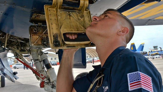 The Blue Angels maintenance team makes sure everything is working just right before the jets can fly.