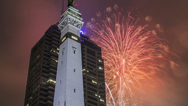 Fireworks explode over the Chase Tower and Soldiers & Sailors Monument on Monument Circle during the Freedom Blast  Monday, July 4, 2016, evening downtown Indianapolis.
