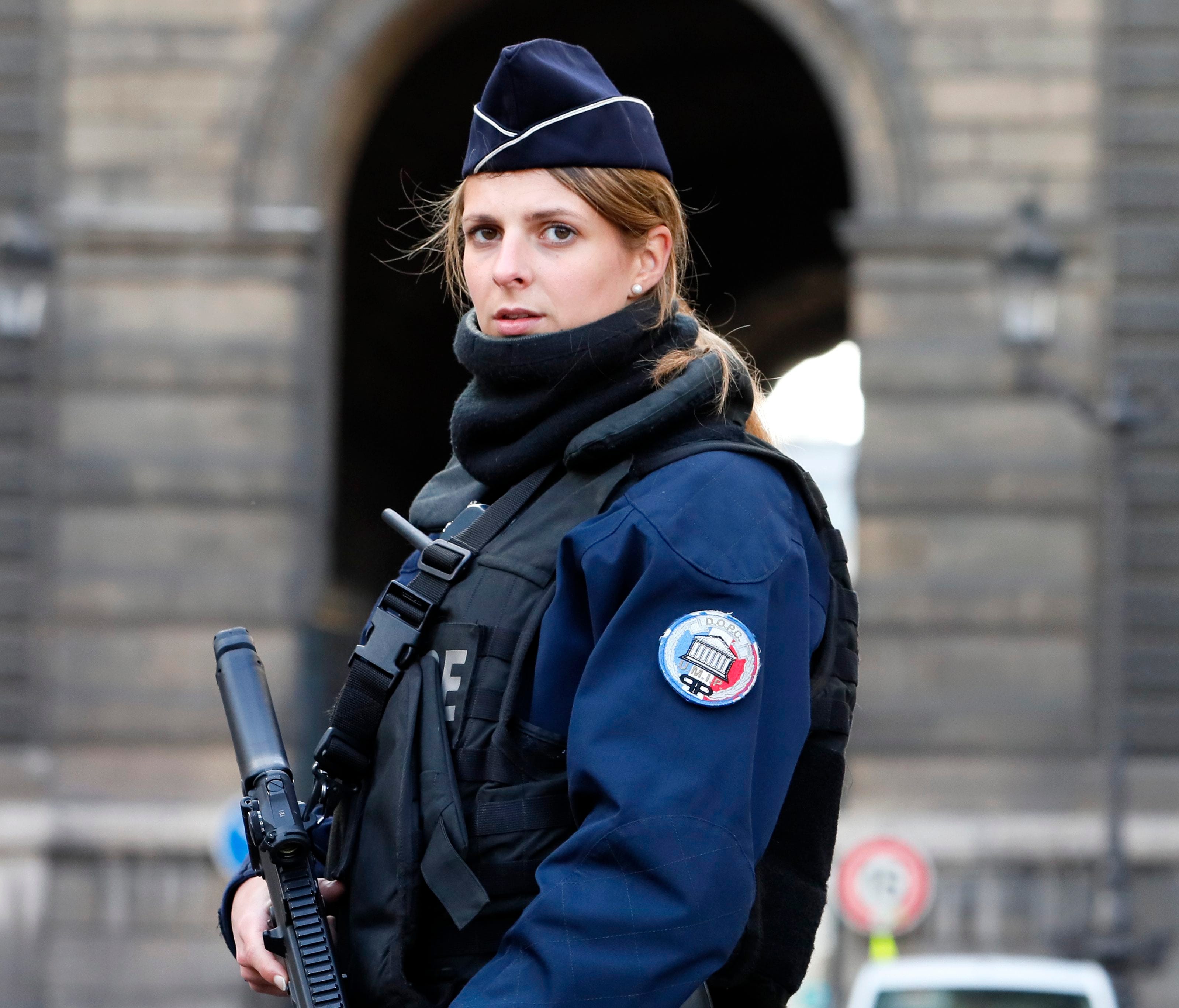 A police officer stands guard near the Carrousel du Louvre where a French soldier opened fire after an attempted machete attack by a man allegedly shouting 'Allahu akbar', in Paris, Feb. 3, 2017.
