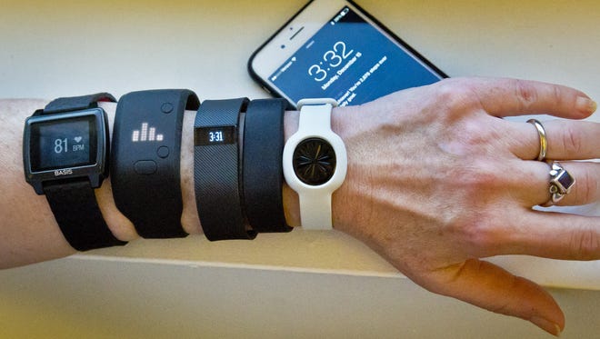 Fitness trackers, from left, Basis Peak, Adidas Fit Smart, Fitbit Charge, Sony SmartBand and Jawbone Move.