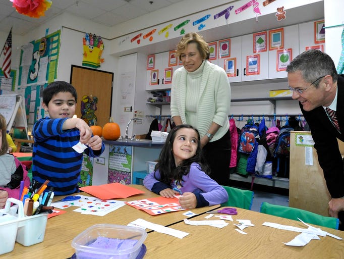 Kindergarten students Savannah Williams, left, Muhammad