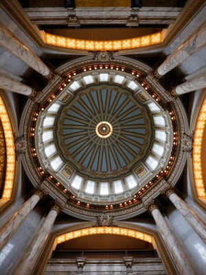 The Beaux Arts style of architecture of the Mississippi Capitol, highlighted by the use of various types of glass throughout and the use of 750 light fixtures, surrounding the rotunda, are factors that helped earn the designation of a national historic landmark, Thursday, May 4, 2017, in Jackson, Miss. An official from the National Park Service made the presentation in the rotunda of the building that opened in 1903.
