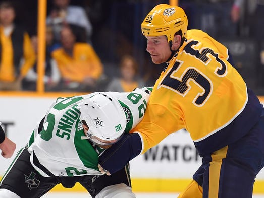 Oct. 12: Predators left wing Cody McLeod, right, and