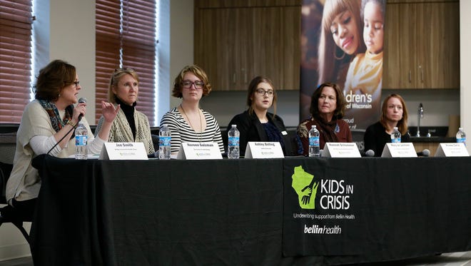 Panelists Jen Smith, left, Noreen Salzman, Ashley Bolling, Hannah Schommer, Mary Jo Lechner, Brooke Davis, answer audience questions during Kids in Crisis town hall held Tuesday night, April 10, 2018, at the Marathon County Public Library in Wausau, Wisc. T'xer Zhon Kha/USA TODAY NETWORK-Wisconsin
