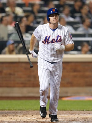 New York Mets' Jay Bruce (19) flips the bat after grounding out to first in the fourth inning of a baseball game against the Atlanta Braves, Tuesday, Sept. 20, 2016, in New York.