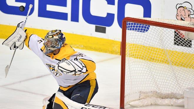 Predators goaltender Pekka Rinne blocks a shot during the second period of Game 3 on Tuesday.
