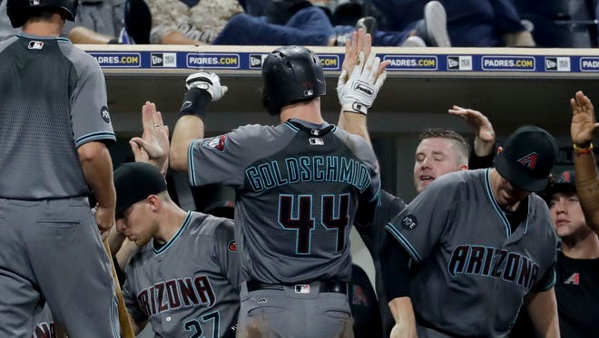 Arizona Diamondbacks' Paul Goldschmidt celebrates after a two-run home run against the San Diego Padres during the sixth inning of a baseball game in San Diego, Tuesday, Sept. 20, 2016.