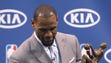 LeBron James reads the inscription after he accepted