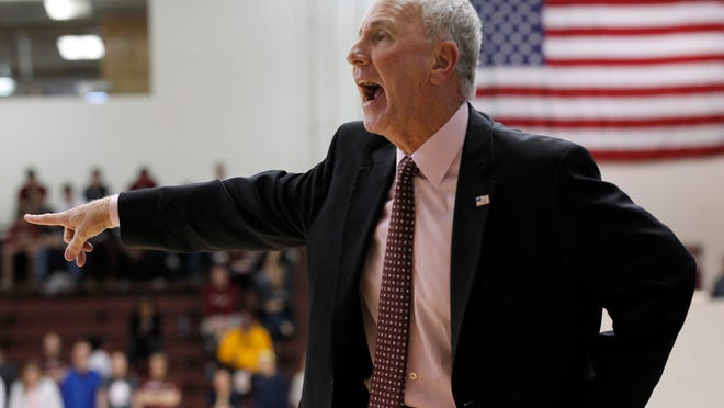 Bellarrmine University head coach Scott Davenport reacts to a call by the officials during the second half of play Quincy University at Knights Hall in Louisville, Kentucky. February 7, 2015