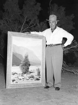 Jimmy Swinnerton with painting c. 1960.