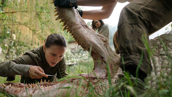 A biologist (Natalie Portman) sinks her teeth into a mystery in “Annihilation,” out Feb. 23.