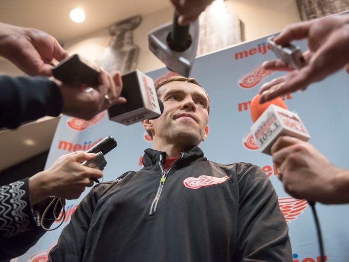 Detroit center Pavel Datsyuk talks to the media about