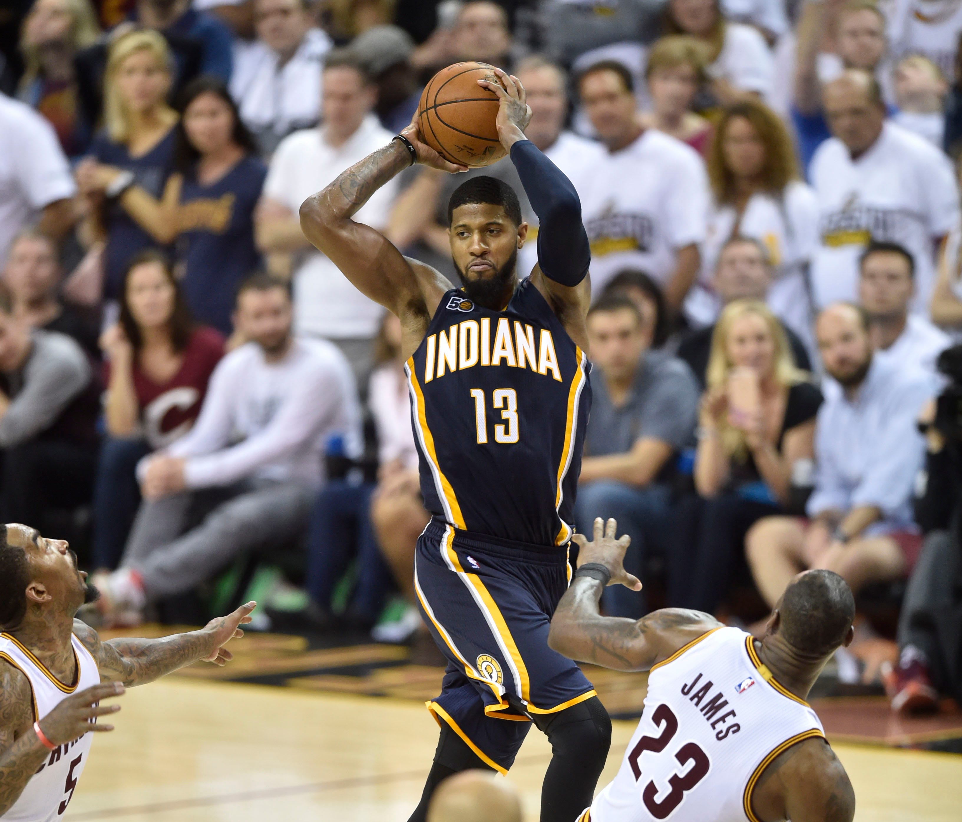Apr 15, 2017; Cleveland, OH, USA; Indiana Pacers forward Paul George (13) throws a pass late in the fourth quarter against the Cleveland Cavaliers in game one of the first round of the 2017 NBA Playoffs at Quicken Loans Arena. Mandatory Credit: David