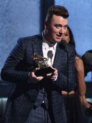 Sam Smith accepts the award for song of the year for “Stay With Me” at the 57th annual Grammy Awards on Sunday, Feb. 8, 2015, in Los Angeles.